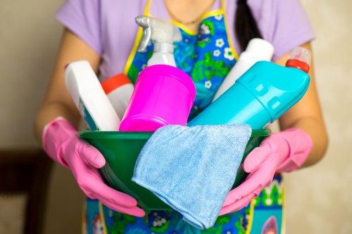 Kitchen surfaces being wiped during regular cleaning